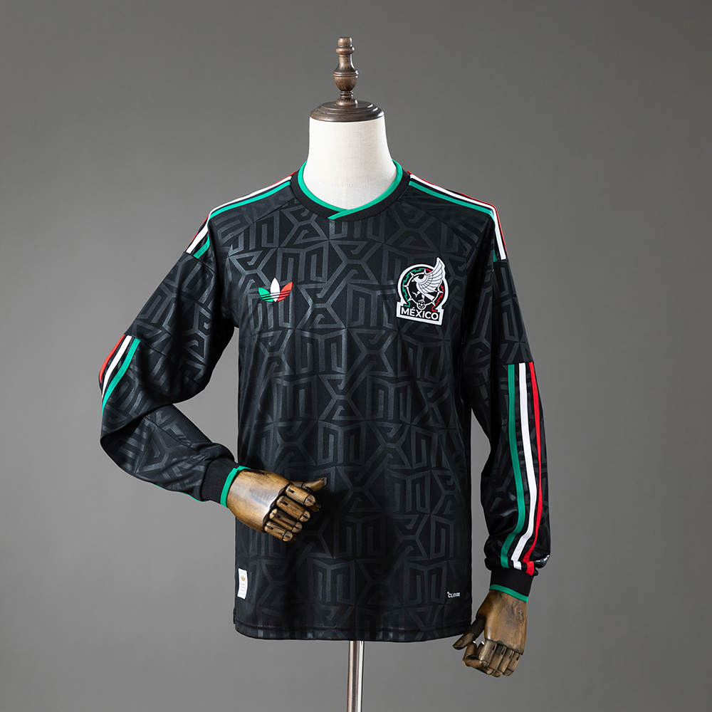 Mens Mexico Long Sleeve Third Jersey 2026 Mens Mexico Long Sleeve Third Jersey 2026 front view in black with Aztec jacquard patterns and tricolor sleeve stripes