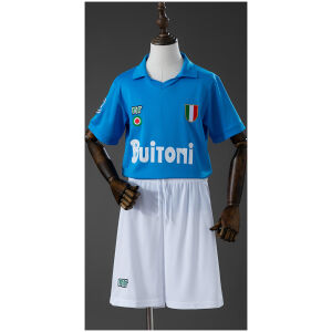 Kids Napoli Retro Home Kit 1987/88 front view in sky blue with Scudetto shield, Buitoni sponsor, and white shorts