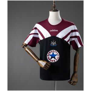 Front view of the Mens Newcastle Retro Training Kit Jersey 1995/96 with chevron panels and Brown Ale star