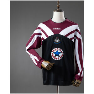 Front view of the Mens Newcastle Retro Long Sleeve Training Kit Jersey 1995/96 with chevron panels and Brown Ale star