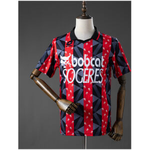 Front view of the Mens OGC Nice Retro Home Jersey 1993/94 in red and black geometric stripes with Bobcat sponsor