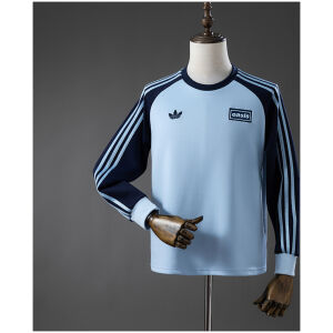 Mens Oasis Tour Three-Striped Sky Blue Long Sleeve T-Shirt Mens Oasis Tour Three-Striped Sky Blue Long Sleeve T-Shirt front view with navy sleeves