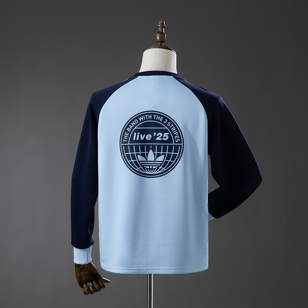 Mens Oasis Tour Three-Striped Sky Blue Long Sleeve T-Shirt Mens Oasis Tour Three-Striped Sky Blue Long Sleeve T-Shirt rear view showing matching team styling