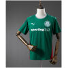 Green Palmeiras home jersey with red side panels and crest, front view