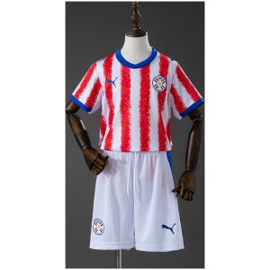 Kids Paraguay Home Kit 2026 Kids Paraguay Home Kit 2026 front view featuring red and white striped jersey with white shorts