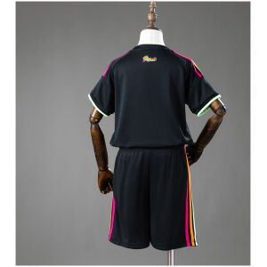 Kids Peru Away Kit 2026 view of black jersey and shorts set featuring neon gradient stripes and Peru script