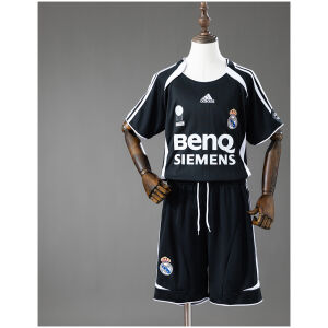 Kids Real Madrid Retro Third Kit 2006/07 front view showing black jersey with white trims and matching black shorts