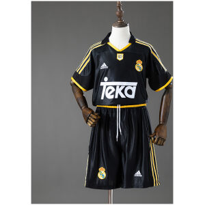 Kids Real Madrid Retro Away Kit 1999/01 front view showing black jersey with gold details and matching shorts