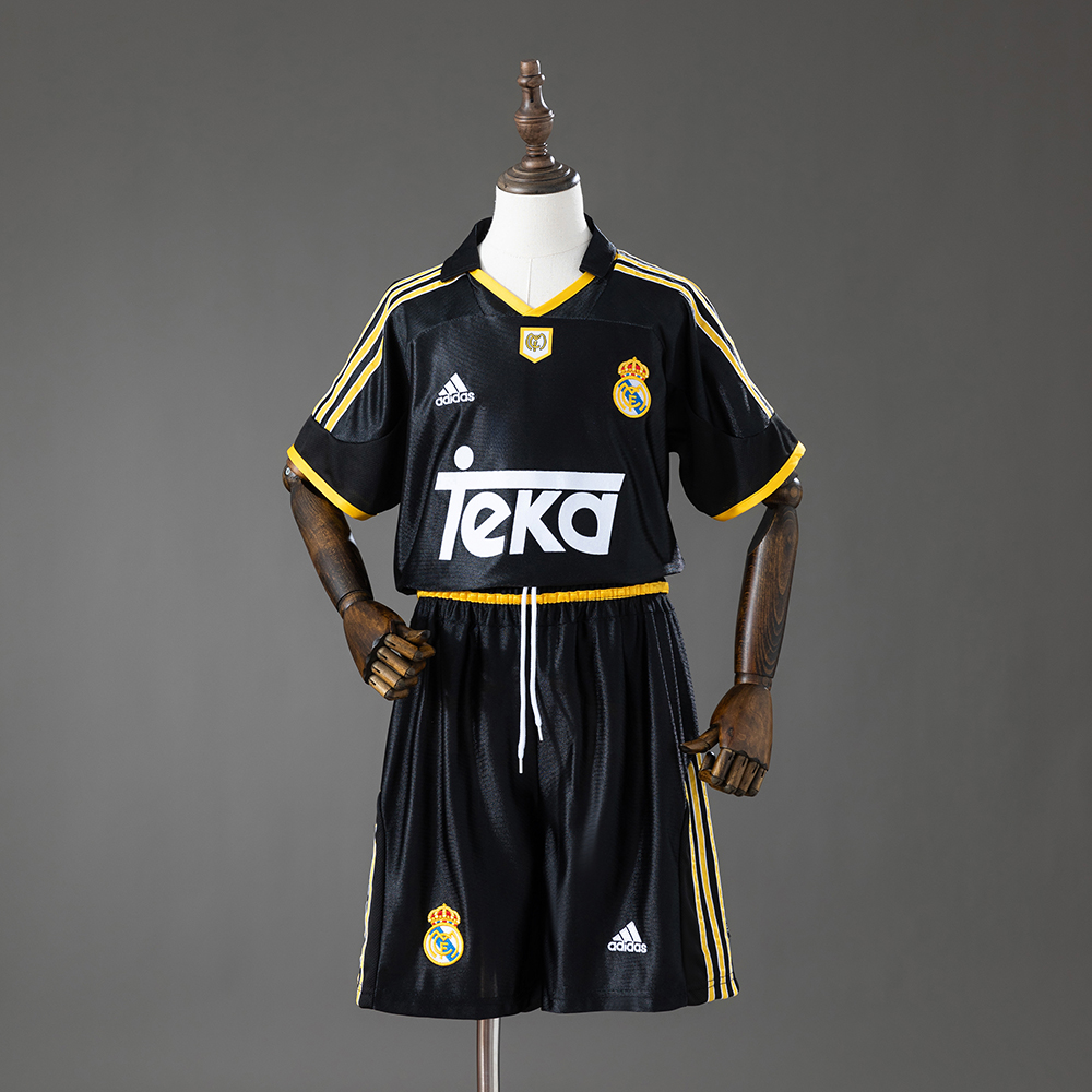 Kids Real Madrid Retro Away Kit 1999/01 Kids Real Madrid Retro Away Kit 1999/01 front view showing black jersey with gold details and matching shorts
