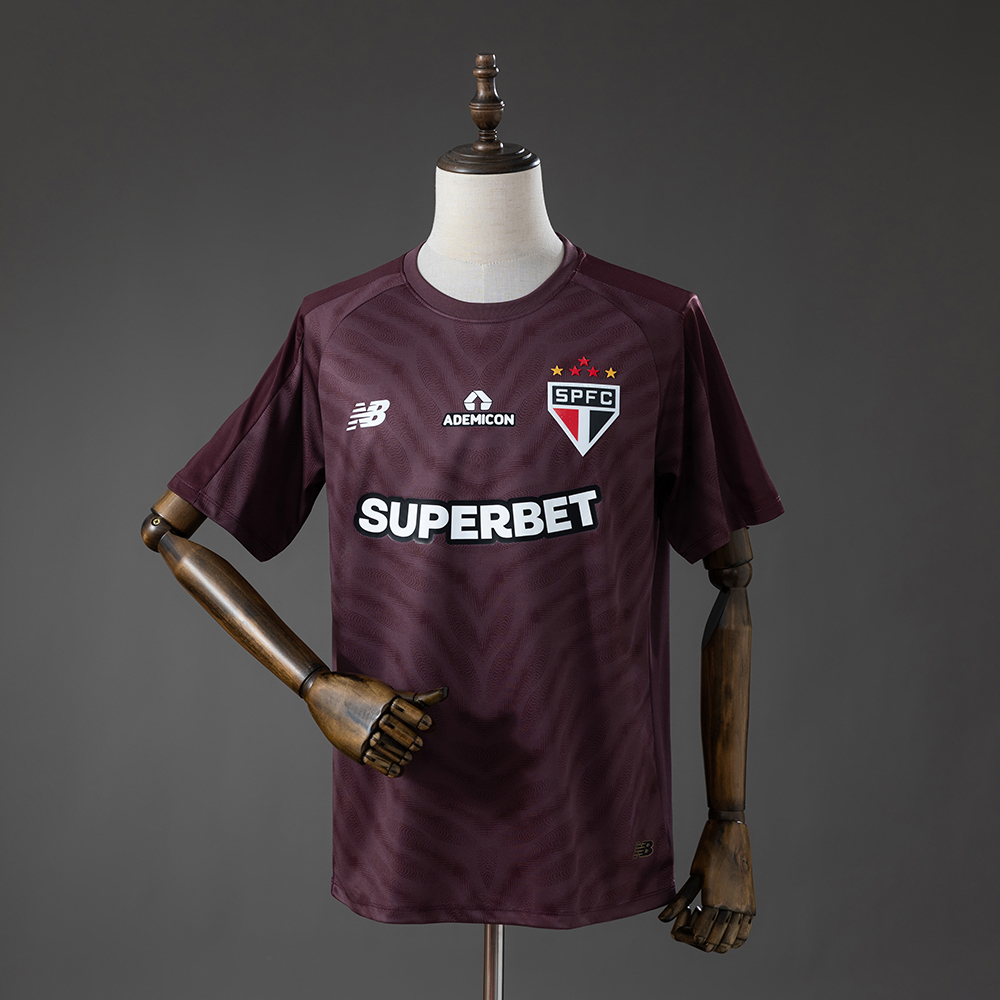 Mens Sao Paulo Deep Burgundy Goalkeeper Jersey 2026/27 Front view of the Mens Sao Paulo Deep Burgundy Goalkeeper Jersey 2026/27 with tonal wave pattern, SPFC crest, and Superbet sponsor on a mannequin.