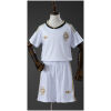 Kids Saudi Arabia Away Kit 2026 front view showing white jersey with gold accents and matching shorts