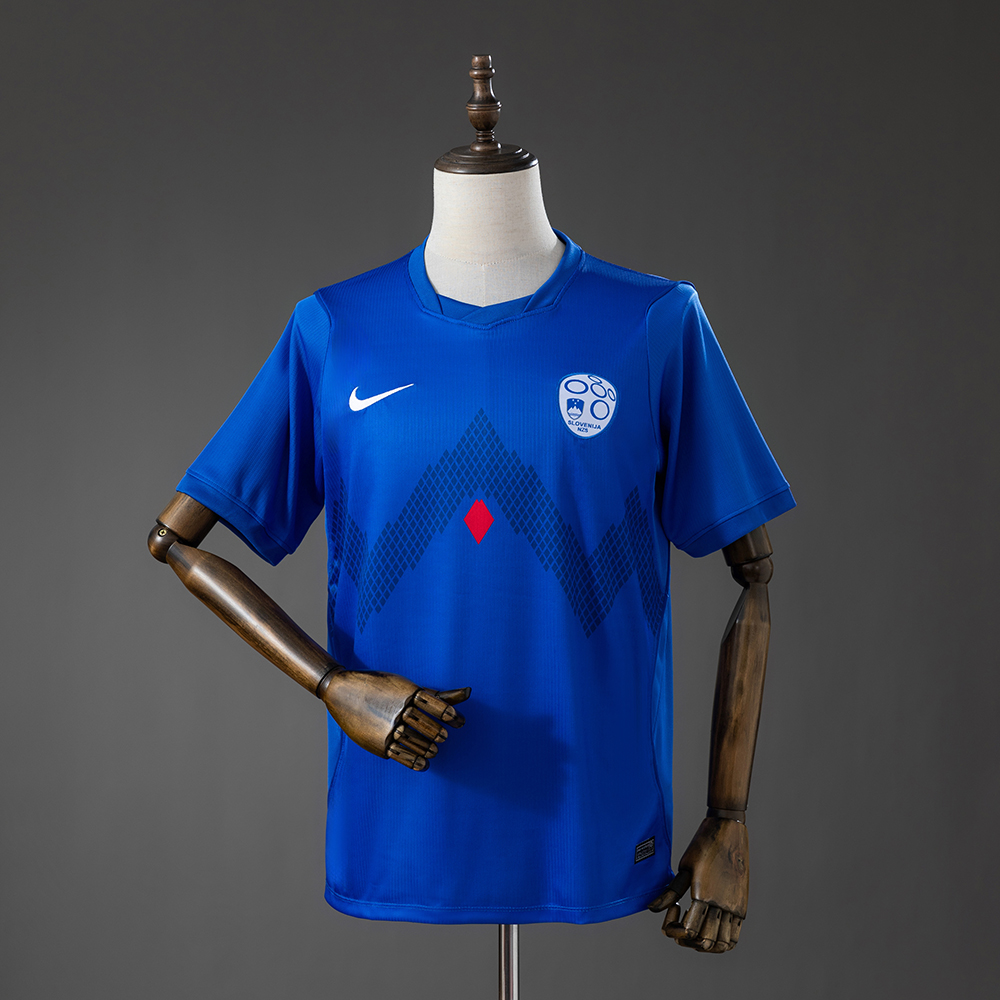 Mens Slovenia Home Jersey 2026 Mens Slovenia Home Jersey 2026 front view in royal blue with Mount Triglav graphic and NZS crest