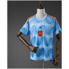 Mens Spain Retro Away Jersey 2022 front view in sky blue with wave graphics and centered crest
