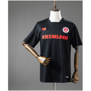 Mens St. Pauli Retro Away Jersey 2013/14 Front view of the Mens St. Pauli Retro Away Jersey 2013/14 in black with red Kiezhelden chest sponsor
