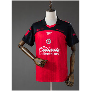 Mens Tijuana Home Jersey 2026/27 front view in red and black with centered Xolos crest and Caliente logo
