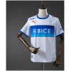 White and blue Universidad Católica home shirt with crest front view