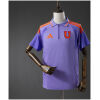 Front view of the Mens Universidad Shirt Polo 2026/27 in lavender with orange three-stripes and quarter zip