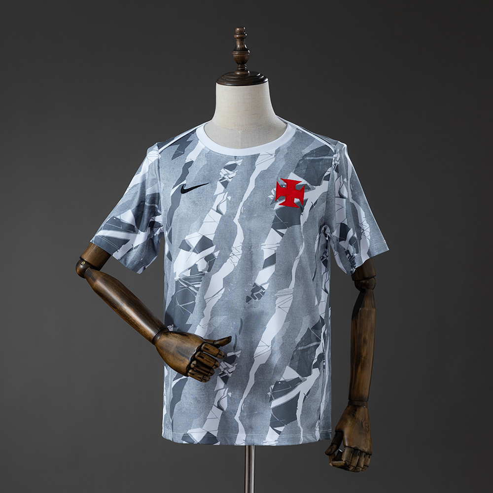Mens Vasco da Gama Pre-Match Jersey 2026/27 Front view of the Mens Vasco da Gama Pre-Match Jersey 2026/27 featuring grey camouflage pattern and red Maltese cross