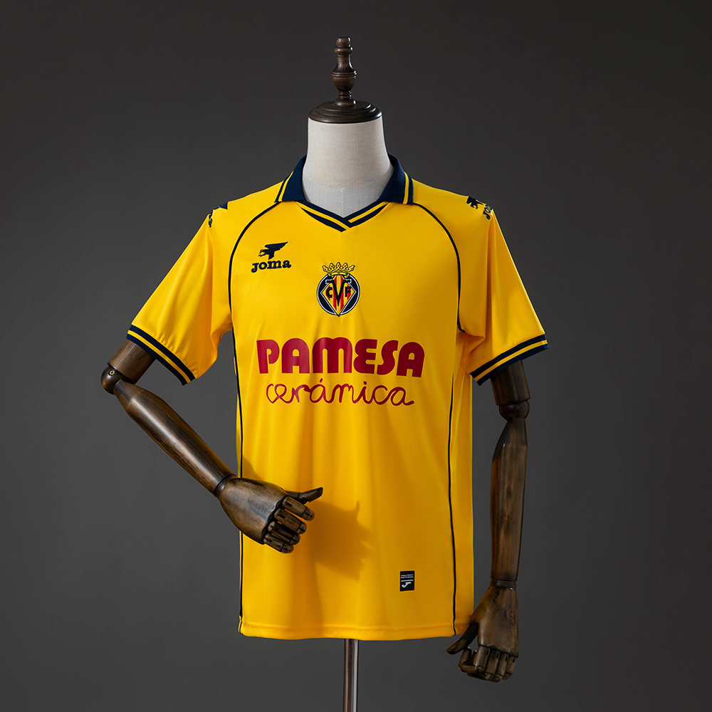 Mens Villarreal Style Retro Jersey 2025/26 Front view of the Mens Villarreal Style Retro Jersey 2025/26 in yellow with navy blue collar, Villarreal crest, and Pamesa sponsor on a mannequin.