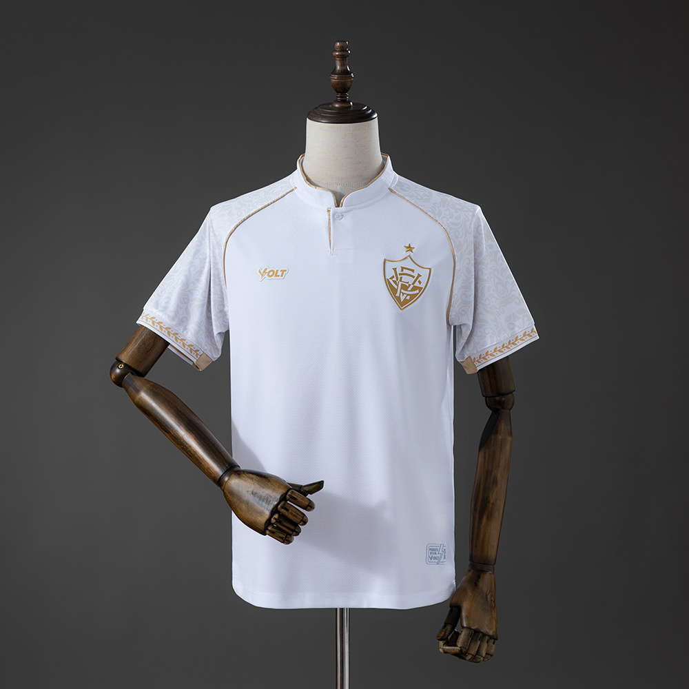 Mens Vitoria New Year’s Eve Special Edition Jersey 2026/27 Front view of the Mens Vitoria New Year’s Eve Special Edition Jersey 2026/27 in white with luxurious champagne gold detailing