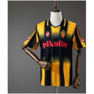 Front view of the Mens Zaragoza Retro Away Jersey 2003/04 displaying black and yellow stripes, Pikolin sponsor, and Real Zaragoza crest on a mannequin.
