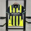 Mens Manchester City Away Jersey 2024/25 on hanger showing navy and neon yellow vertical stripes with white sponsor