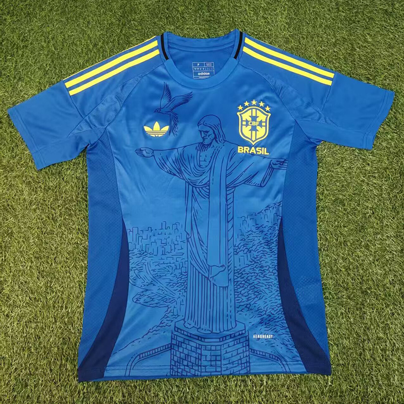 Mens Brazil Blue Jesus Jersey 2025 Mens Brazil Blue Jesus Jersey 2025 flat view showing royal blue body with Christ statue and yellow stripes