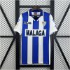 Mens Malaga Retro Home Jersey 1998/99 front view on display