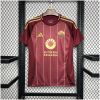 Mens AS Roma Home Jersey 2024/25 on hanger showing carmine red body with gold vertical pinstripes