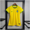 Womens World Cup Brazil Commemorative Edition Yellow Jersey 2022 on hanger showing yellow body with green trim