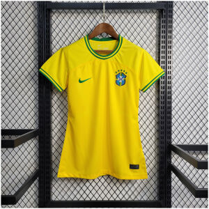 Womens World Cup Brazil Commemorative Edition Yellow Jersey 2022 on hanger showing yellow body with green trim