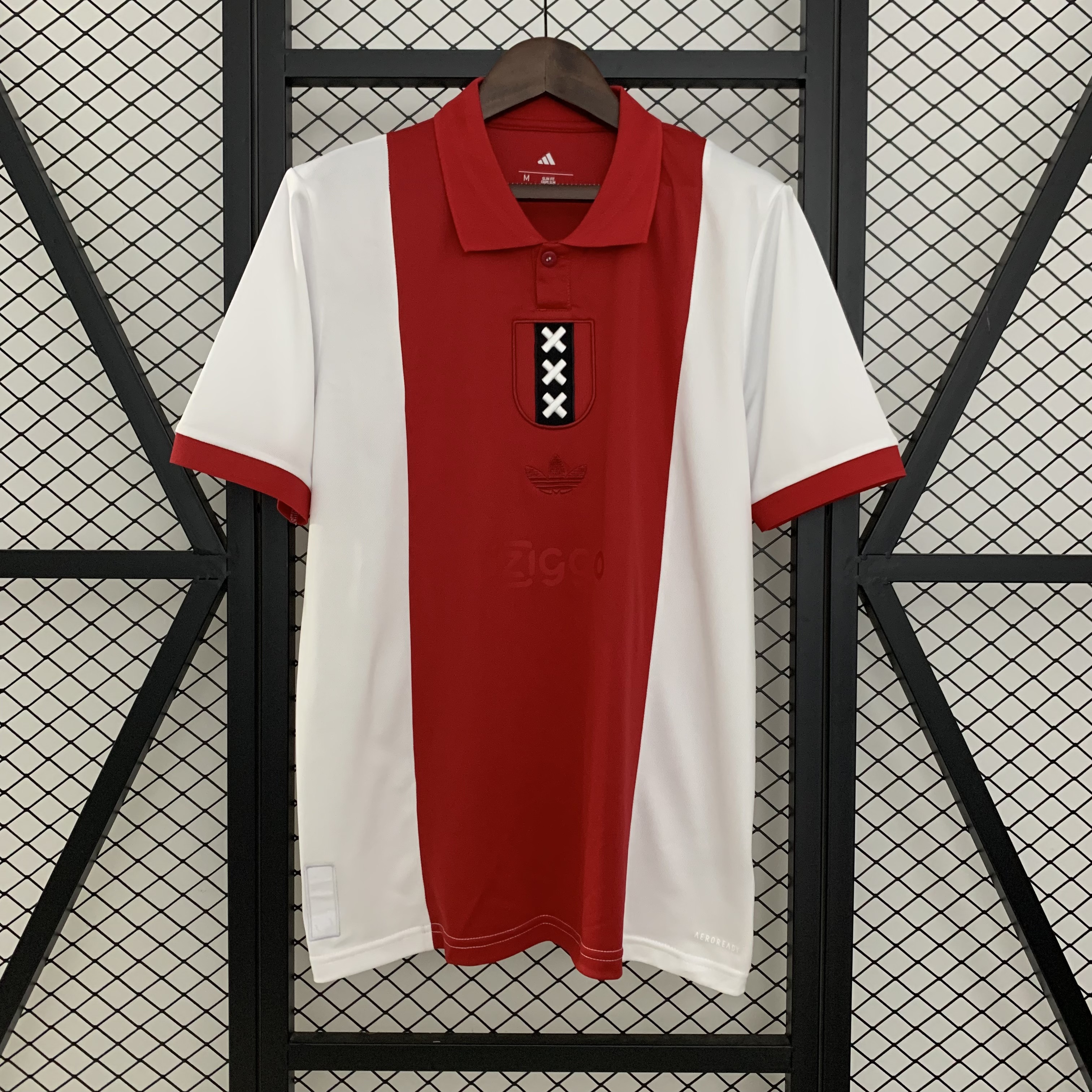 Mens Ajax Commemorative Edition Jersey 2025/26 Mens Ajax Commemorative Edition Jersey 2025/26 front view on display
