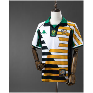 Mens South Africa World Cup Retro Home Jersey 1998 Mens South Africa World Cup Retro Home Jersey 1998 on mannequin showing asymmetrical gold and black panels