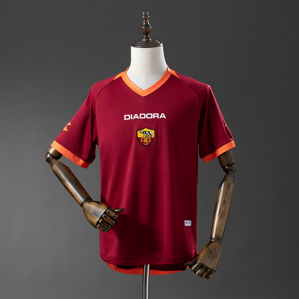 Mens Roma Retro Home Jersey 2006/07 Mens Roma Retro Home Jersey 2006/07 on mannequin showing carmine red body and centered wolf crest