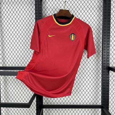 Mens Belgium Retro Home Jersey 2000 Mens Belgium Retro Home Jersey 2000 angled on hanger displaying crimson red body and crowned Belgian crest