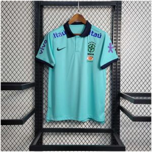 Mens World Cup Brazil Light Blue Polo 2022 on hanger showing aqua body with navy polo collar