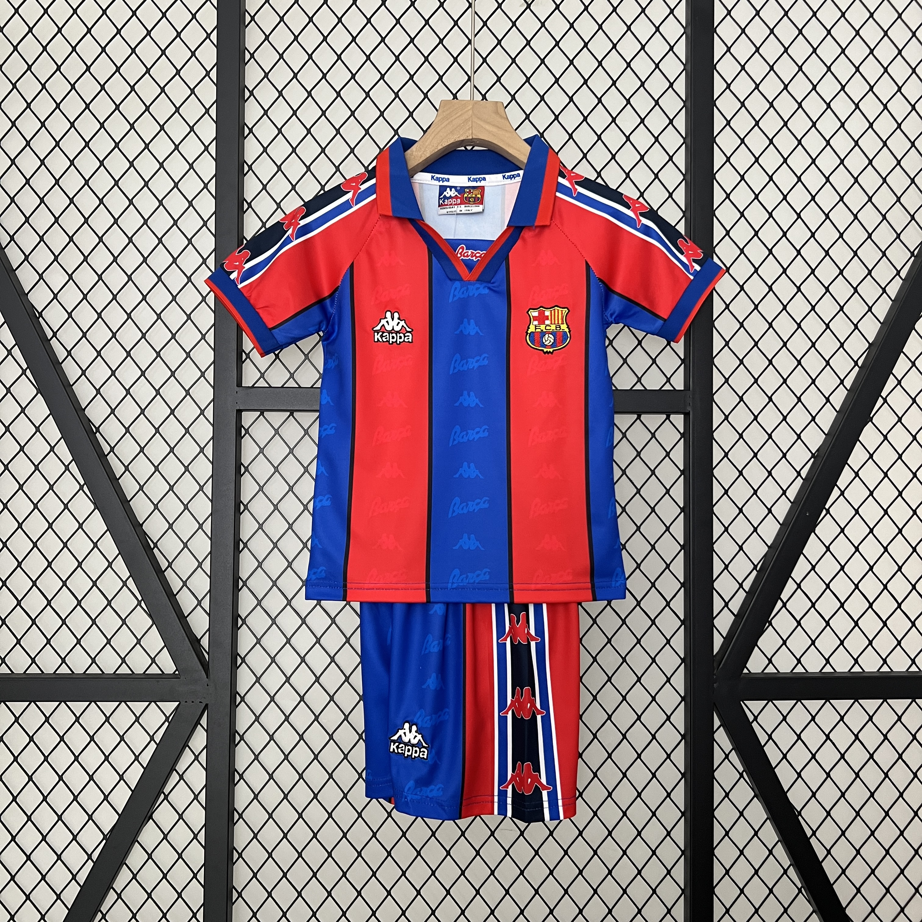 Kids Barcelona Retro Home Kit 1995/97 Kids Barcelona retro home shirt with blaugrana stripes and polo collar front view