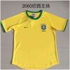 Mens Brazil Yellow Retro Home Jersey 2000 on hanger showing yellow body with wide green cuffs
