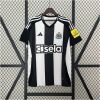Mens Newcastle United Home Jersey 2024/25 on hanger showing black and white stripes with black sleeves and sela