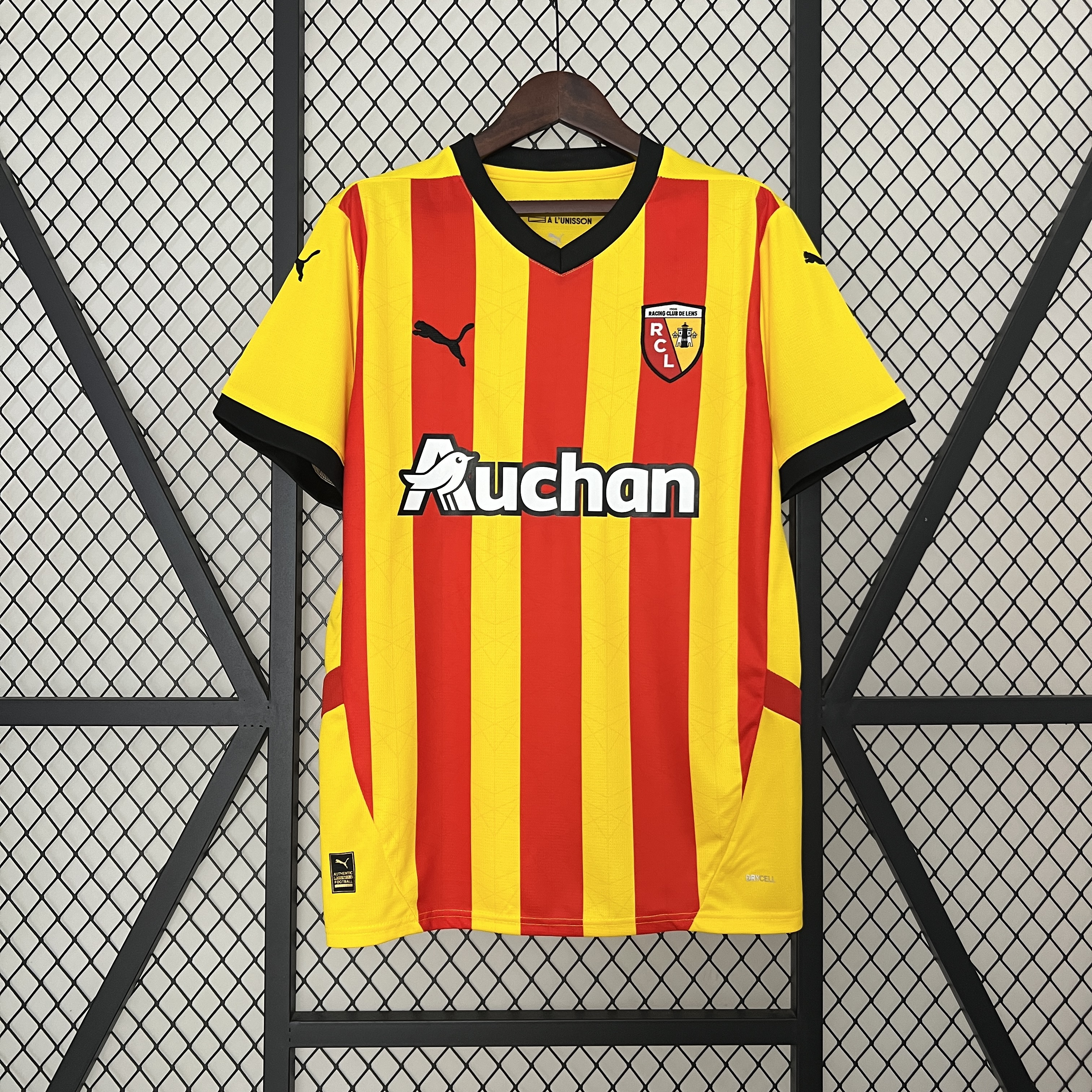 Mens Lens Home Jersey 2024/25 Mens Lens Home Jersey 2024/25 on hanger displaying bold yellow and red vertical stripes with black collar trim