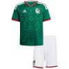 Kids Mexico 2026 home shirt with Aztec chest print and white shorts front view