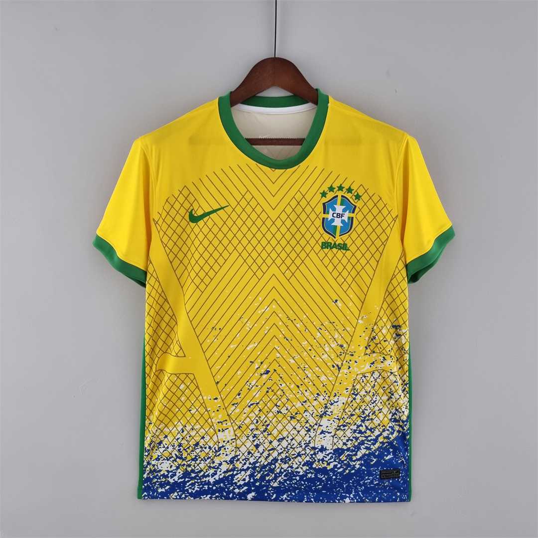 Mens World Cup Brazil Yellow Special Edition Jersey 2022 Mens World Cup Brazil Yellow Special Edition Jersey 2022 on hanger showing yellow body with net grid and paint splatter