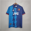 Mens Arsenal Retro Away Jersey 1995/96 on hanger showing cyan and navy lightning bolt split with JVC sponsor