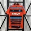 Mens Marseille Retro Third Jersey 2011/12 on hanger showing bright orange body and navy-blue horizontal stripes