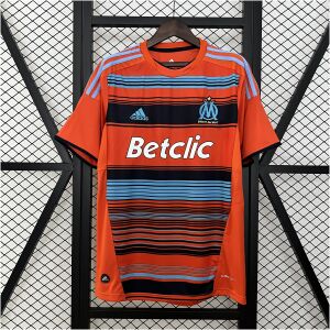 Mens Marseille Retro Third Jersey 2011/12 on hanger showing bright orange body and navy-blue horizontal stripes