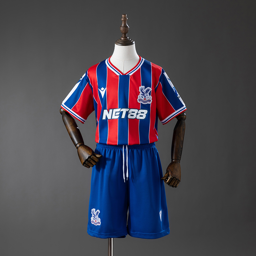 Kids Crystal Palace Home Kit 2025/26 Kids Crystal Palace Home Kit 2025/26 jersey and shorts set front view on mannequin