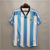 Mens World Cup Argentina Retro Home Jersey 1998 on hanger showing black polo collar and Albiceleste stripes