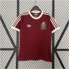 Mens Mexico Red Retro Special Edition Jersey 2025 on hanger showing wine red body and cream white trim
