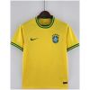 Mens World Cup Brazil Concept Yellow Jersey 2022 on hanger showing yellow body with striped green cuffs