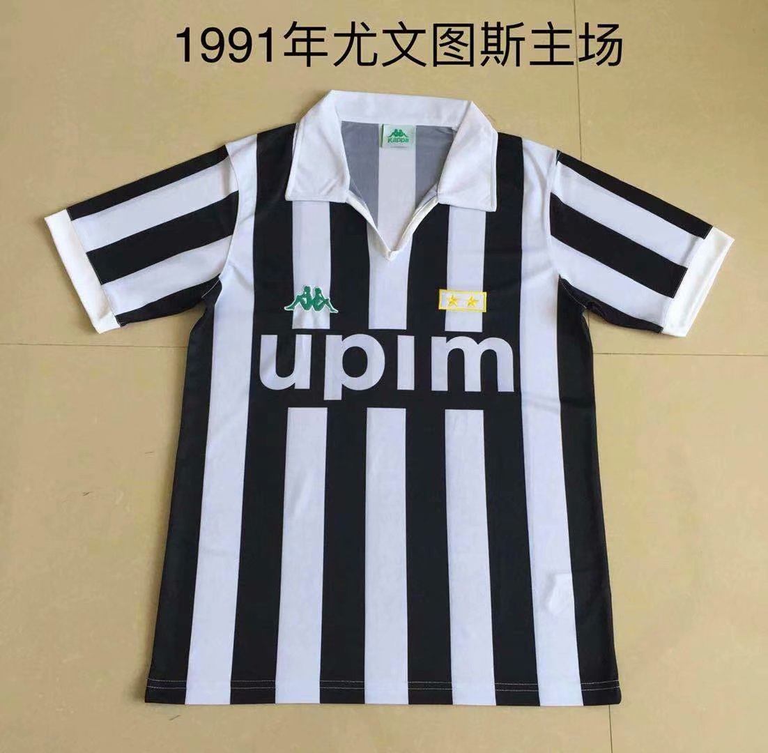 Mens Juventus Retro Home Jersey 1991/92 Mens Juventus Retro Home Jersey 1991/92 laid flat showing black and white vertical stripes with Upim sponsor